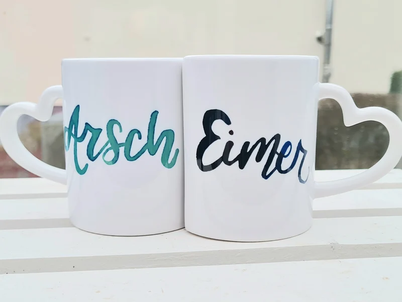 Partnertasse "Arsch und Eimer"