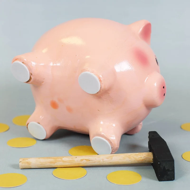 Spardose - Schwein mit Hammer