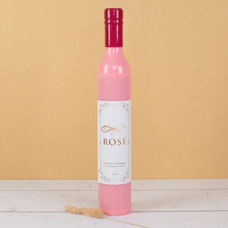 Taschen Regenschirm als Weinflasche Rosé