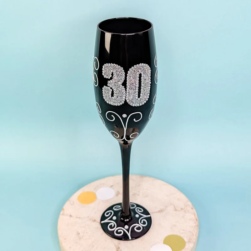 Schwarzes Sektglas mit Glitzerzahl für runde Geburtstage & Jubiläum