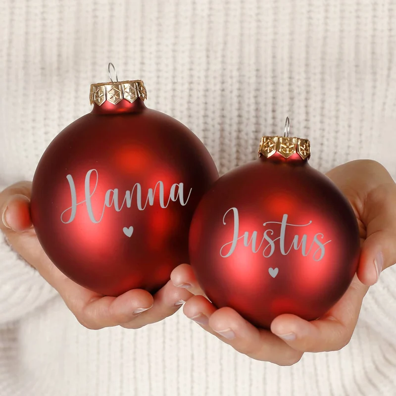 Weihnachtskugel mit Ihrem Wunschnamen und kleinem Herzchen graviert