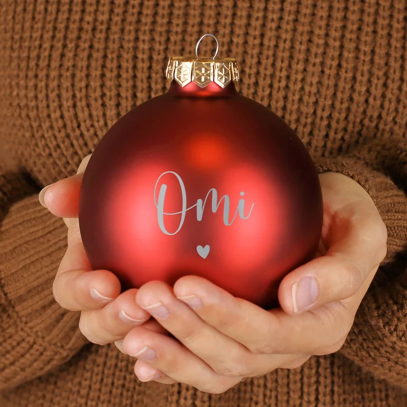 Weihnachtskugel mit Ihrem Wunschnamen und kleinem Herzchen graviert