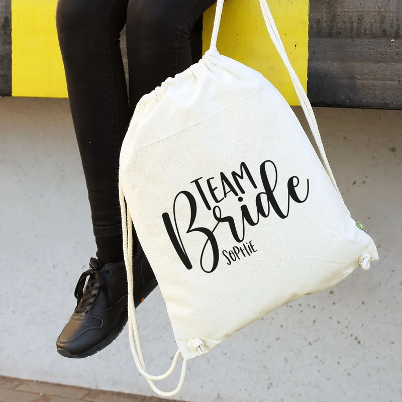 JGA Baumwoll-Rucksack mit Wunschname | Team Bride | Schwarz & Natur