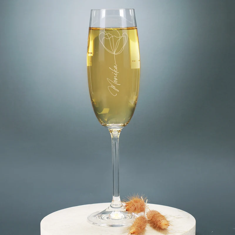 Graviertes Sektglas mit moderner Blüte und Ihrem Wunschnamen