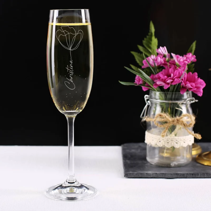 Graviertes Sektglas mit moderner Blüte und Ihrem Wunschnamen