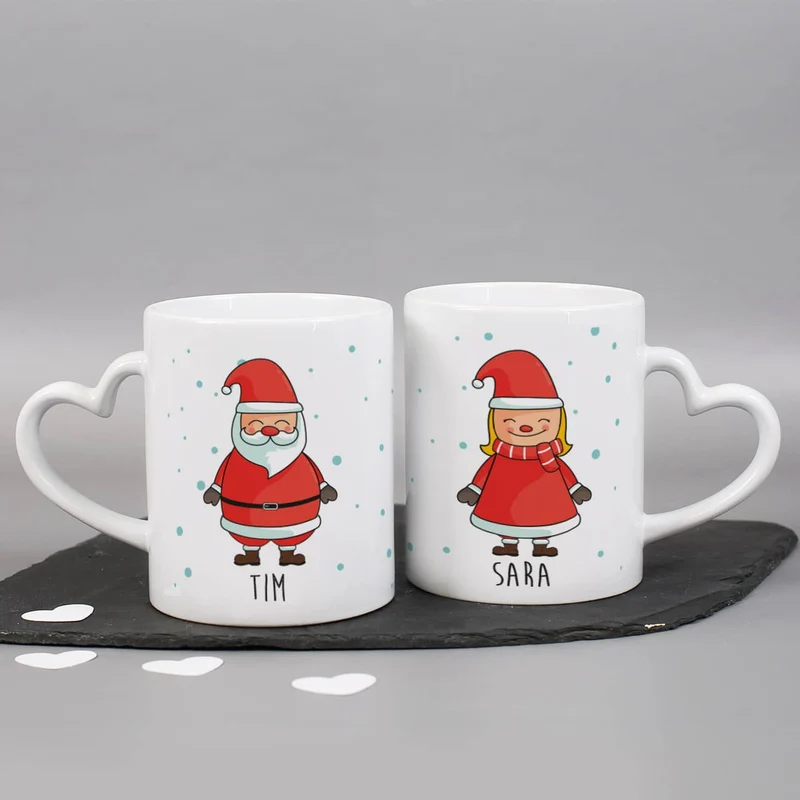 Paartassen mit Herzhenkel und Weihnachtsmotiv