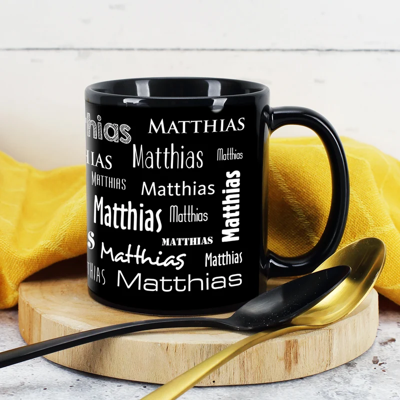 Schwarze Tasse mit Ihrem Wunschnamen