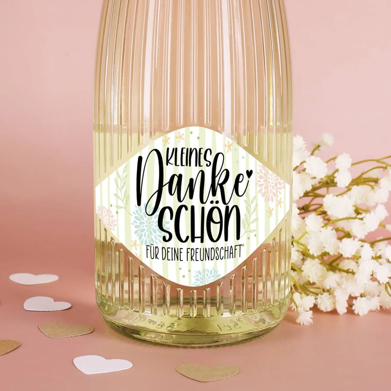 Kleines Dankeschön - Fruchtsecco in zwei Sorten mit Ihrem Wunschtext
